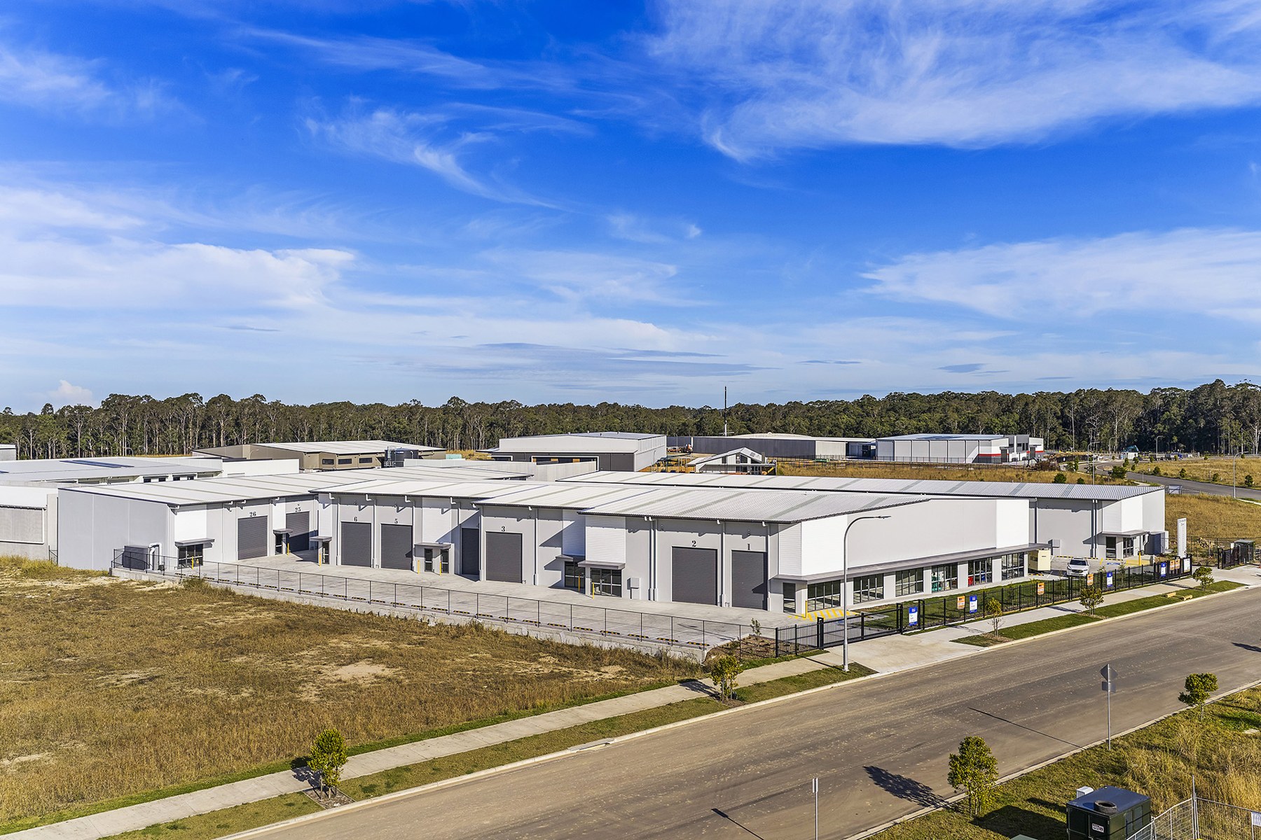 Completed Cedar Commons warehouse frontage photographed in June 2026